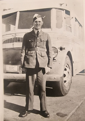 A person in a uniform standing in front of a bus

AI-generated content may be incorrect.