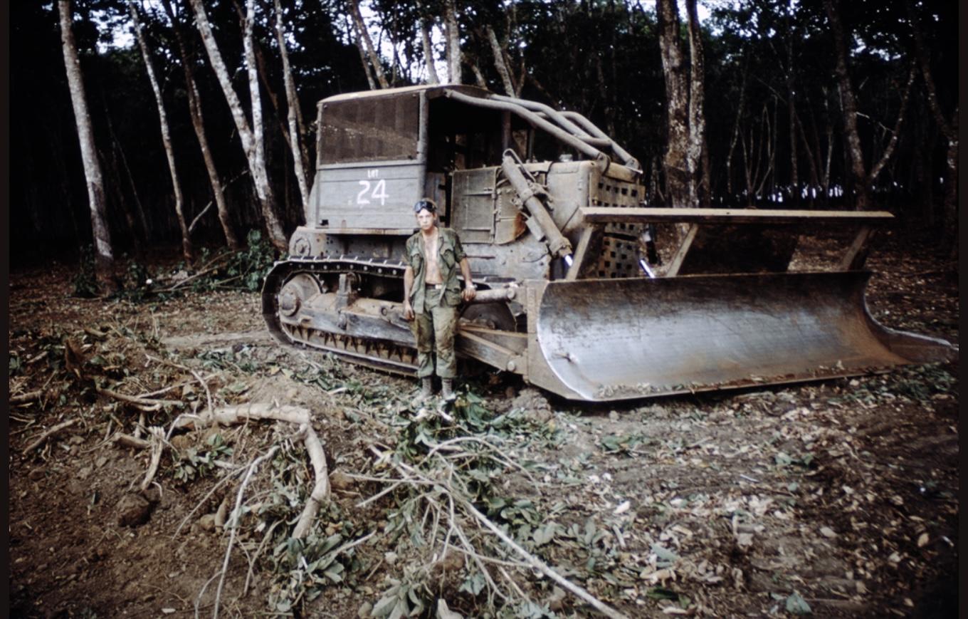 Jungle bulldozers clearing forests Vietnam