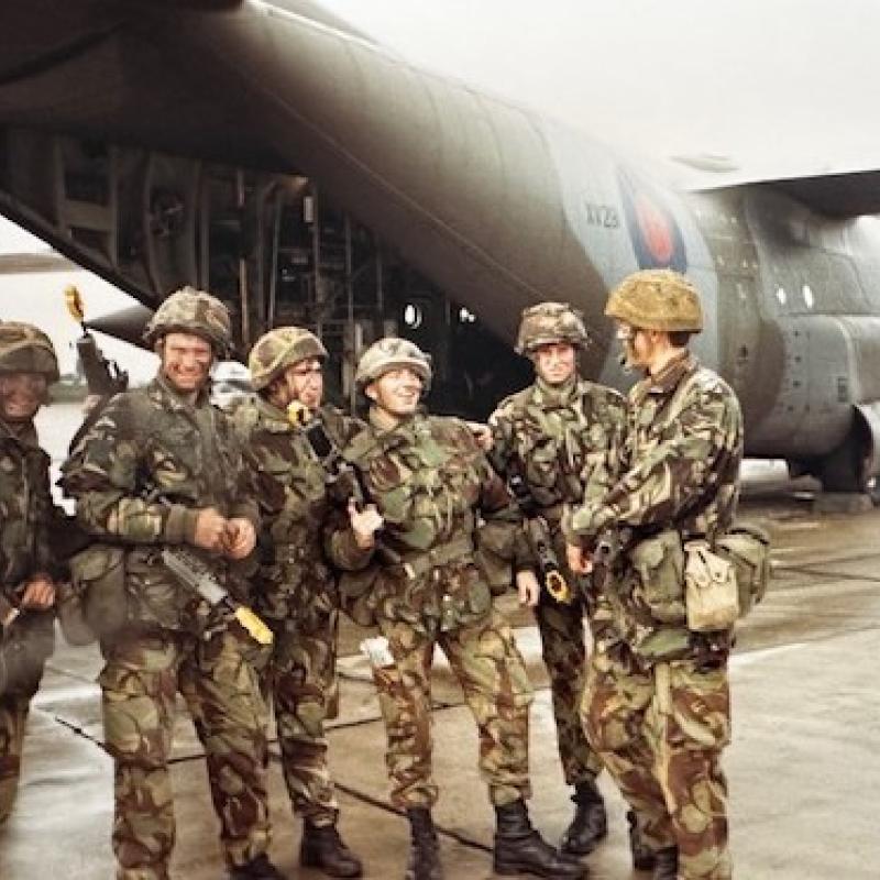 Carl (3rd from right) and comrades in front of a Dakota