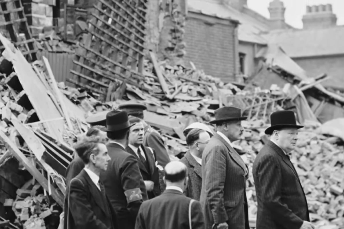 Winston Churchill examining bombing damage ww2 blitz bombing 