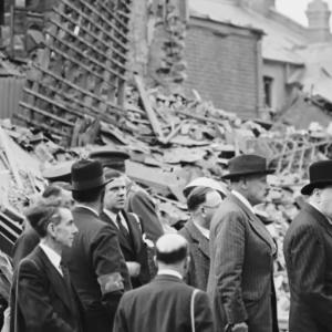 Winston Churchill examining bombing damage ww2 blitz bombing 