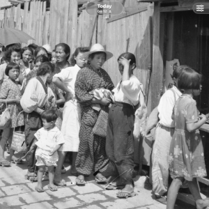 Japanese queuing for food rations 