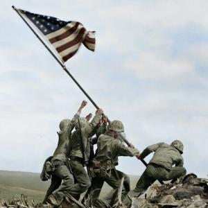 Us marines on Nima raising USA flag 