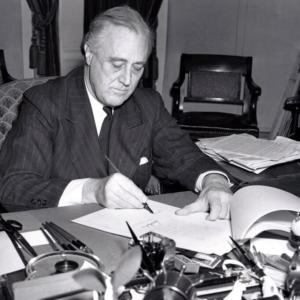 President Roosevelt signing lend lease scheme ww11